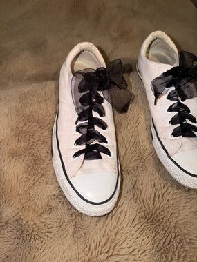 Converse Women’s Low Top Canvas Sneakers in White with Black Ribbon Laces